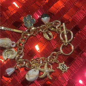 AVON NIB Charm Medley Link Bracelet